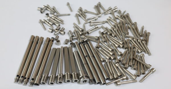small batch of custom machined parts